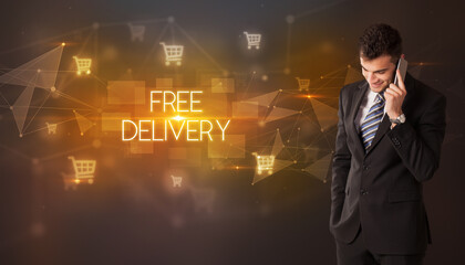 Businessman with shopping cart icons and FREE DELIVERY inscription, online shopping concept