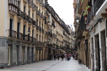 Fototapeta premium the constitution square in San Sebastian under the clouds, city of San Sebastian, Spain