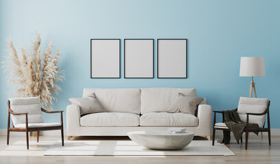Blank three poster frames mock up in light blue room interior , 3d rendering