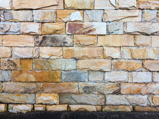 Wall of natural stone as textured background