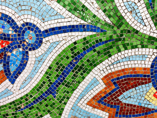 Detail of beautiful old collapsing abstract ceramic mosaic adorned building. Venetian mosaic as decorative background. Selective focus. Abstract Pattern. Abstract mosaic colored ceramic stones