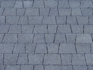 Grey shaped paving stones