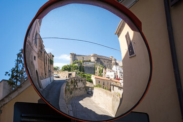 Panoramic landscape of the city of Gaeta with the castle reflected by a mirror. Italy