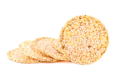 Crispbread with chia seeds and salt, isolated on white background. Corn crisps. Dietary food with low calories.