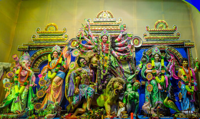 Durga Puja or Durgotsava,is an annual Hindu festival celebrated mainly in West Bengal,Indian.Durga is Goddess riding a lion with many arms each carrying weapon and defeating evil power of Mahishasura.