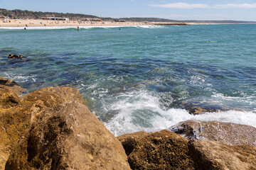 The resort is right on the ocean beach sand wave and stones.