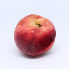 Nectarine fruit isolated on white background. A variation of peach