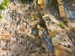 textured background of rock structure. Caucasus Mountains