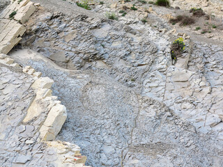 textured background of rock structure. Caucasus Mountains