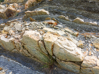 textured background of rock structure. Caucasus Mountains