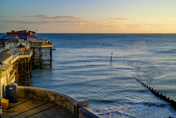 Obraz premium A view of the pier and promenade in the seaside town of Cromer on the North Norfolk coast