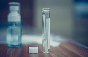 closeup photo of a swab tube from the home Covid-19 test kit