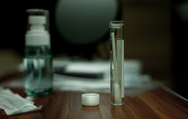 closeup photo of a swab tube from the home Covid-19 test kit - 374556905