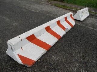 Awareness red striped roadblock for car traffic in Budapest suburb, Hungary