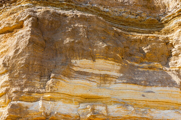 textured background of rock structure. Caucasus Mountains
