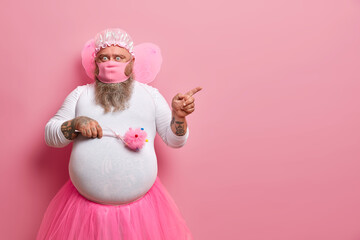 Surprised man foolishes around while staying at home during quarantine for long period of time,...