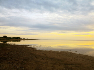 Authentic water landscape at sunset on a beautiful evening. Vityazevsky Liman, Krasnodar Territory, Russia