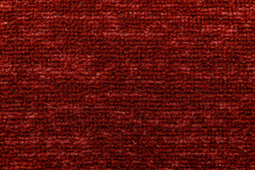 The texture of the red carpet. Fleecy surface. Background