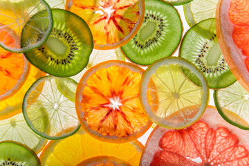 Abstract photo of mix fruit slices, top down