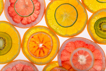 Abstract photo of mix fruit slices, top down