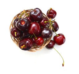 cherry in basket, on a white background