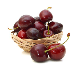 cherry in basket, on a white background