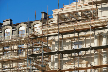 scaffolding and new building as background