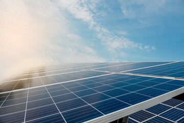 Photovoltaic power plant. Solar photovoltaic panels on blue sky background