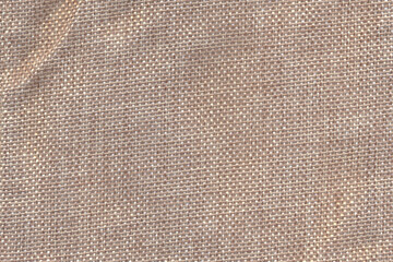 Natural texture of jute fabric for background. Beige jute linen
