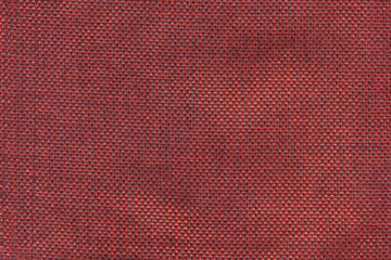 Natural texture of jute fabric for background. Red jute linen