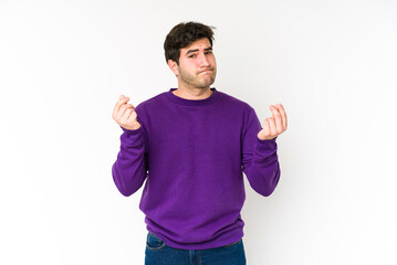 Fototapeta premium Young man isolated on white background showing that she has no money.