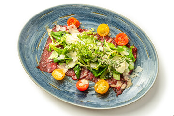 Veal carpaccio with arugula, parmesan and cherry tomatoes