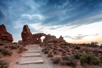Sunset at Arches National Park outside Moab, Utah as seen through the Turret Arch © Allen.G