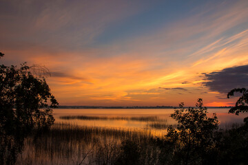 Summer lake at dawn, nature background.