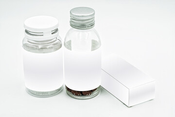 Two pill bottles, one medicine box, with white label mockup