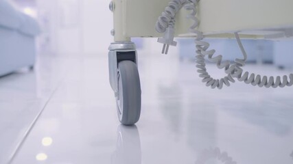 Mobile medical equipment moving to hospital ward, emergency aid, crisis therapy