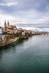 Fototapeta na wymiar View on the Basel Cathedral and old town of Basel from the Rhein river