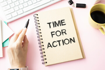 business woman holding a notebook with the text Time for action