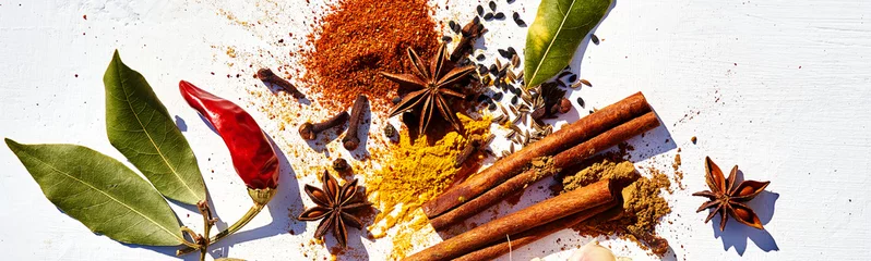 Tuinposter Various types of spices and herbs kitchen on white background with copy space. © PINKASEVICH
