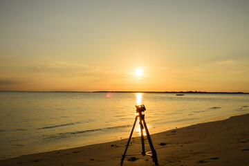 silhouette of a tripod at sunset