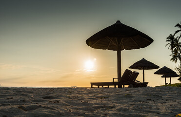 silhouettes of beach huts in zanzibar