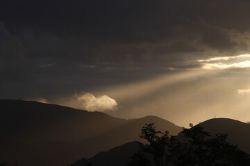 Sunlights through the clouds in the evening
