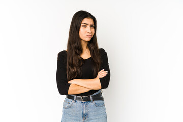 Young indian woman isolated on purple background unhappy looking in camera with sarcastic expression.