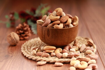 Nuts mix in a wooden plate