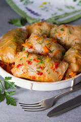 Stuffed cabbage leaves with meat, rice and vegetables. Chou farci, dolma, sarma, sarmale, golubtsy or golabki - popular dish in many countries.
