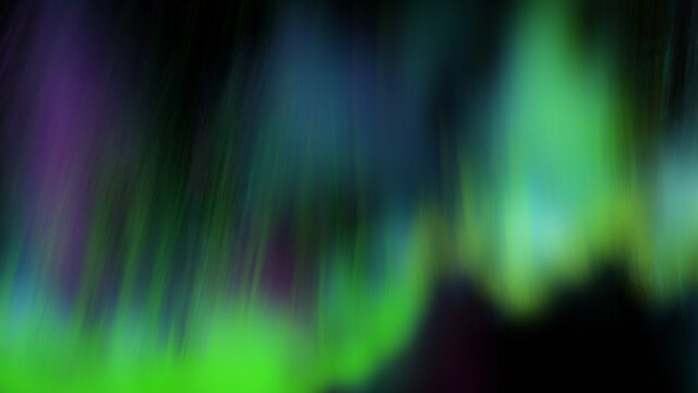 Green lights in the sky. Northern lights over the city and forest. Textured miracle abstract glowing background