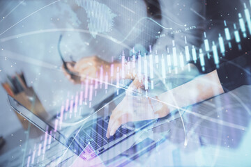 Multi exposure of woman hands typing on computer and financial chart hologram drawing. Stock market analysis concept.