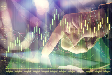 Multi exposure of man's hands holding and using a phone and financial chart drawing. Market analysis concept.