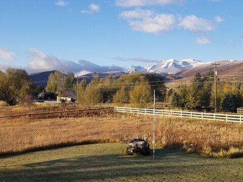 Mt Timpanogos Overlooking A Field