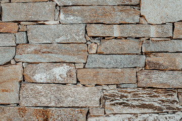 Light beige stone wall tiles. Wall texture and pattern.